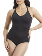 a woman wearing a black body shaper shaping bodysuit shapewear