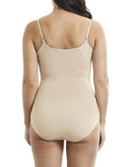 a woman wearing a nude body shaper shaping bodysuit shapewear