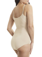 a woman wearing a nude body shaper shaping bodysuit shapewear