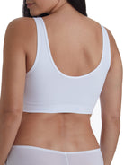 a woman wearing a white lounge bra