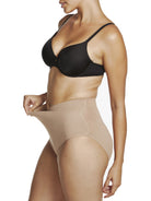 a woman wearing nude tummy control underwear