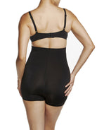 a woman wearing black high waisted tummy control shapewear shorts