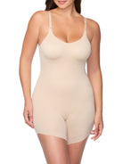 a woman wearing a beige slanted hem body shaper