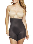 a woman wearing black high waisted tummy control shapewear shorts