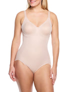 a woman wearing a nude tummy control body shaper shapewear