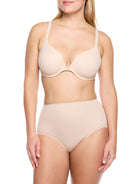 a woman wearing nude tummy control underwear