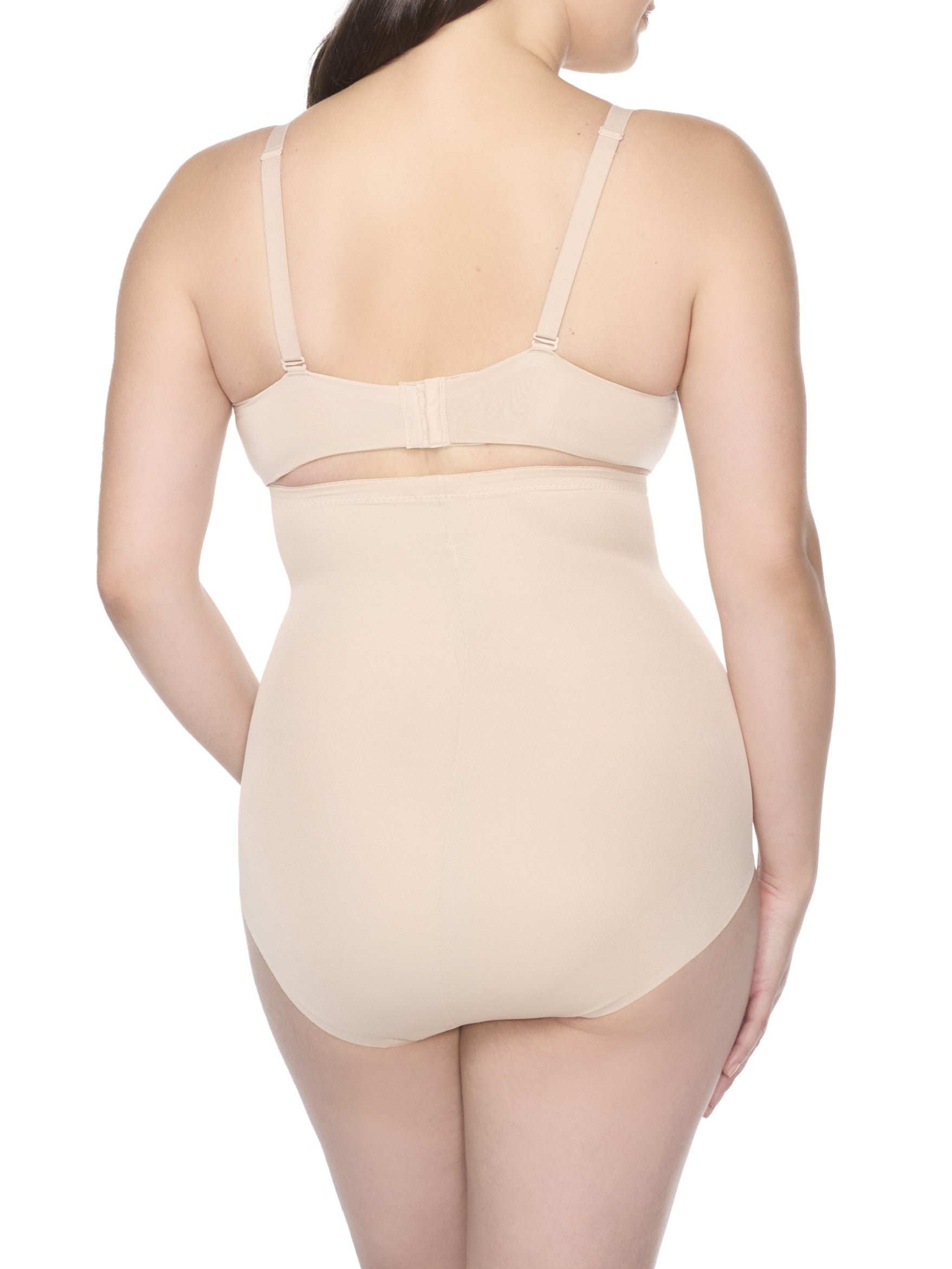 a woman wearing nude high waisted tummy control underwear shapewear