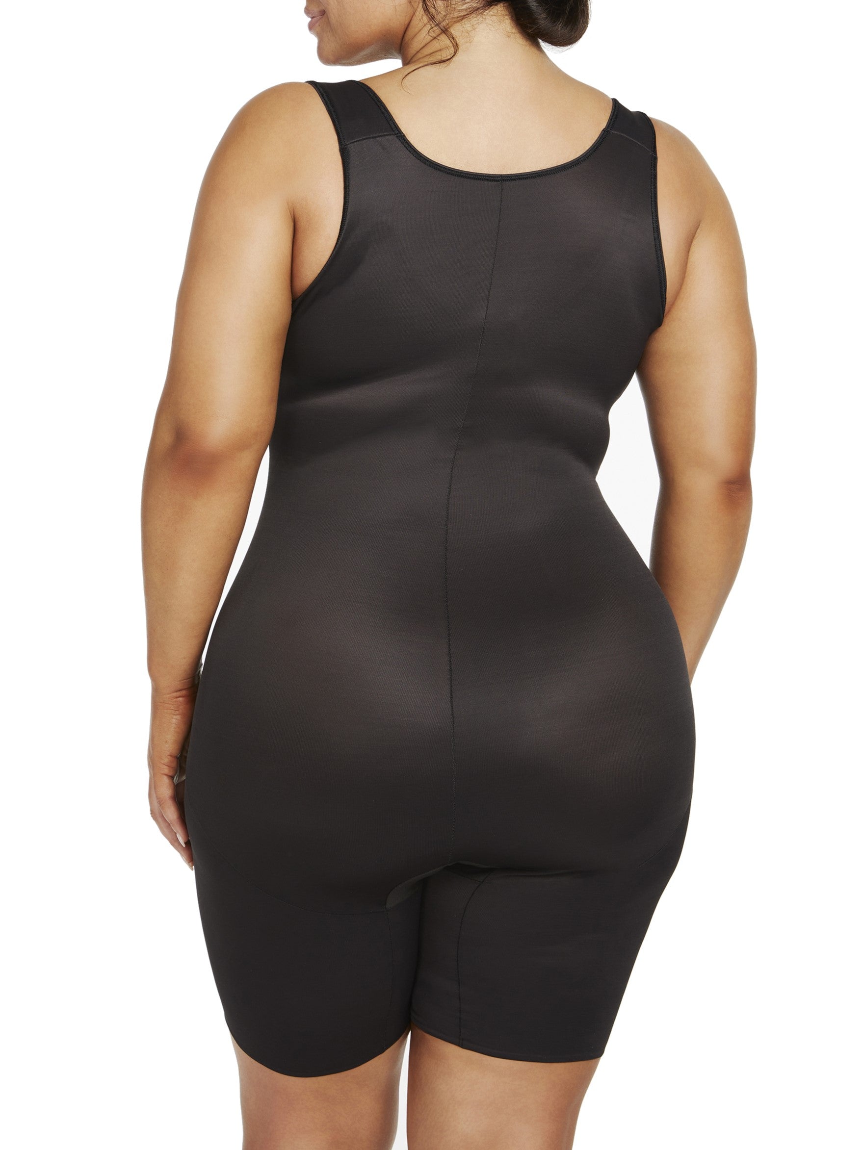 a woman wearing a black plus size open bust body shaper