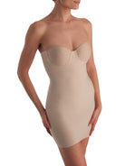 a woman wearing a nude shaping bodysuit body shaper full slip shapewear