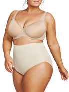 a woman wearing nude plus size tummy control underwear shapewear