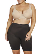 a woman wearing black plus size tummy control shapewear shorts