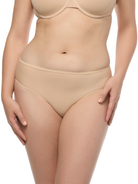 a woman wearing beige hipster panties