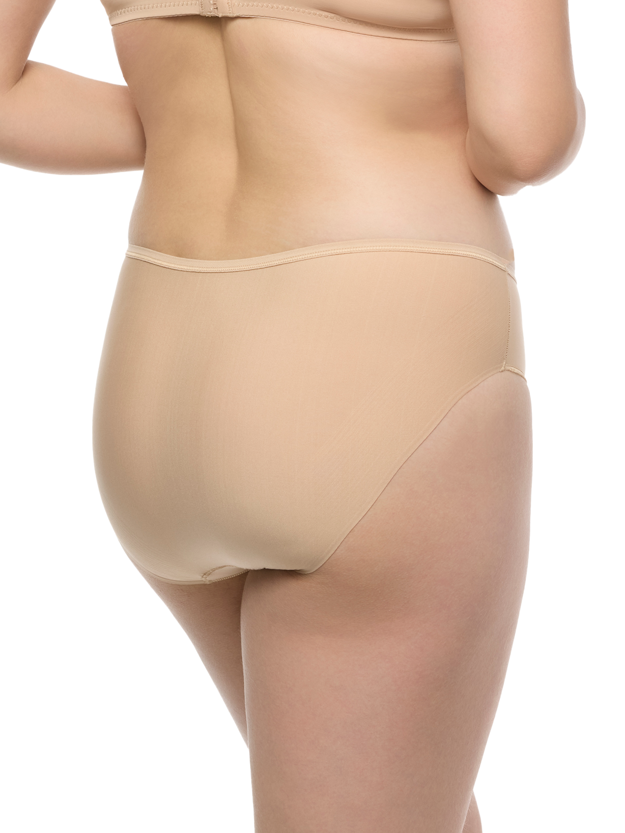 a woman wearing beige hipster panties