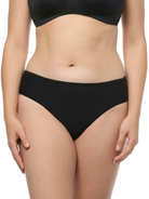 a woman wearing black hipster panties