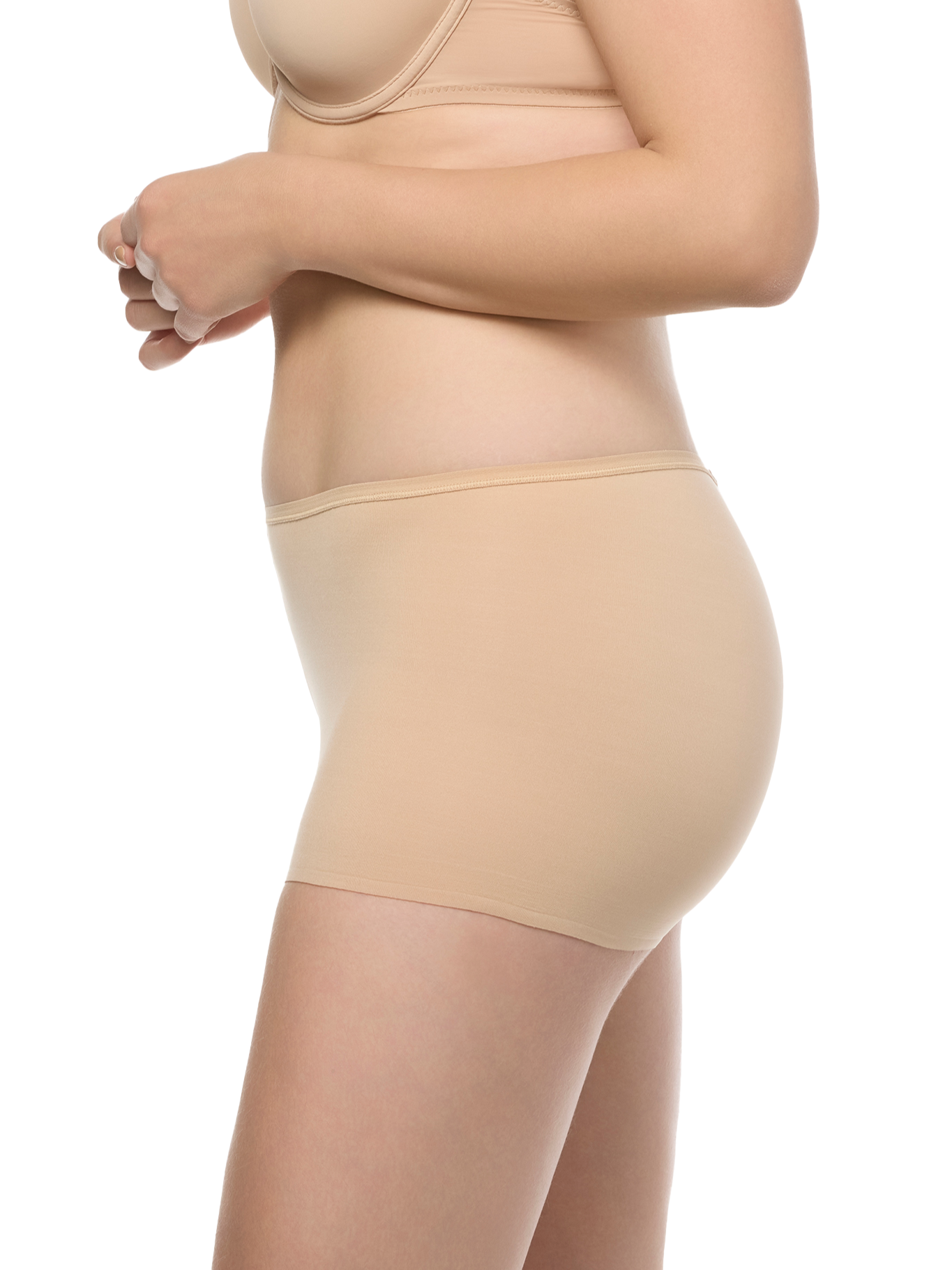 a woman wearing a beige boyshort panty underwear