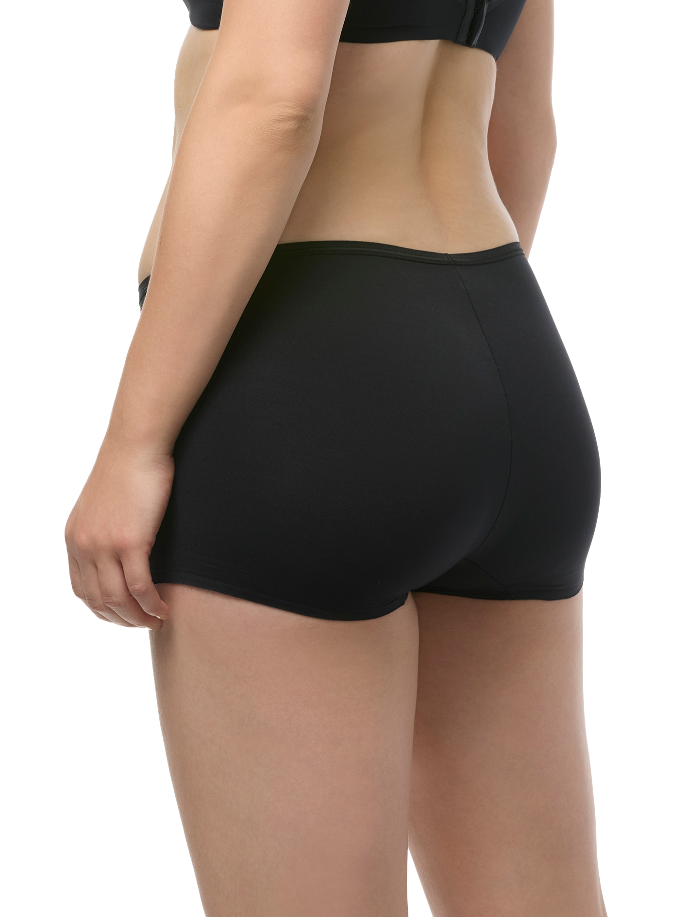 a woman wearing a beige boyshort panty underwear