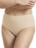 a woman wearing a beige brief panty