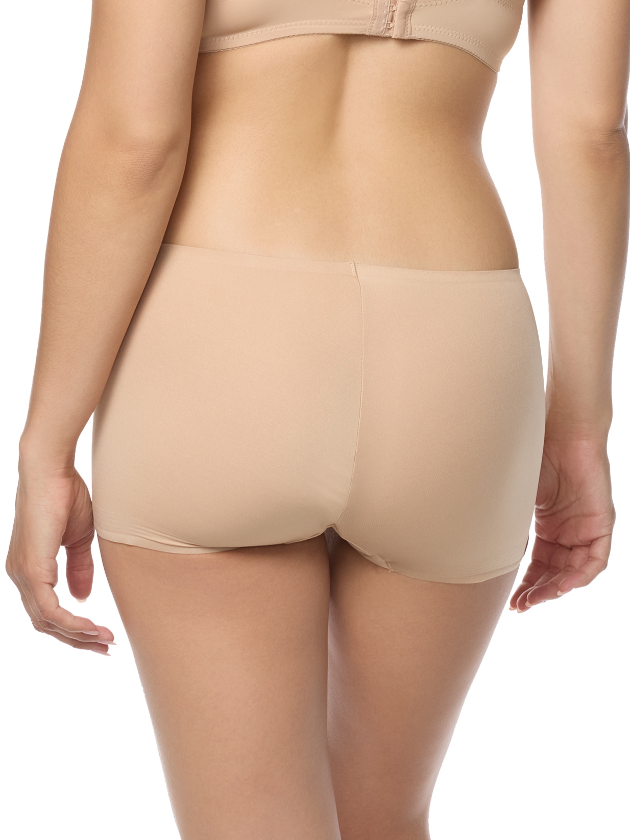 a woman wearing a beige boyshort boy short panty women's underwear