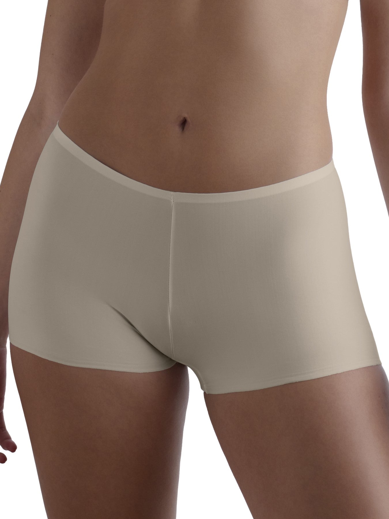 a woman wearing a beige boyshort panty