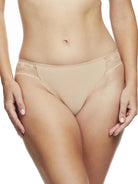 a woman wearing a beige bikini panty