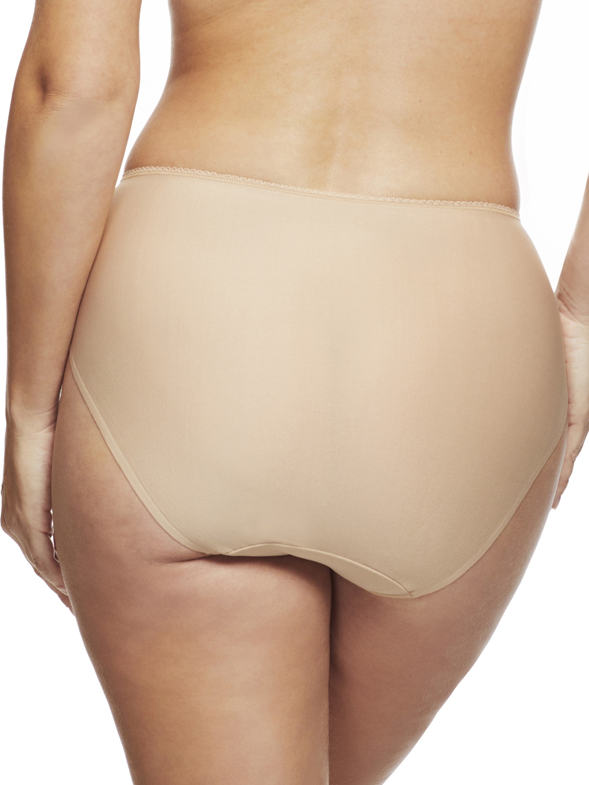 a woman wearing a beige high-cut brief panty