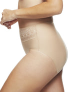 a woman wearing a nude brief panty