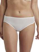 a woman wearing a white high cut brief panty