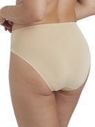 a woman wearing a nude high cut brief panty