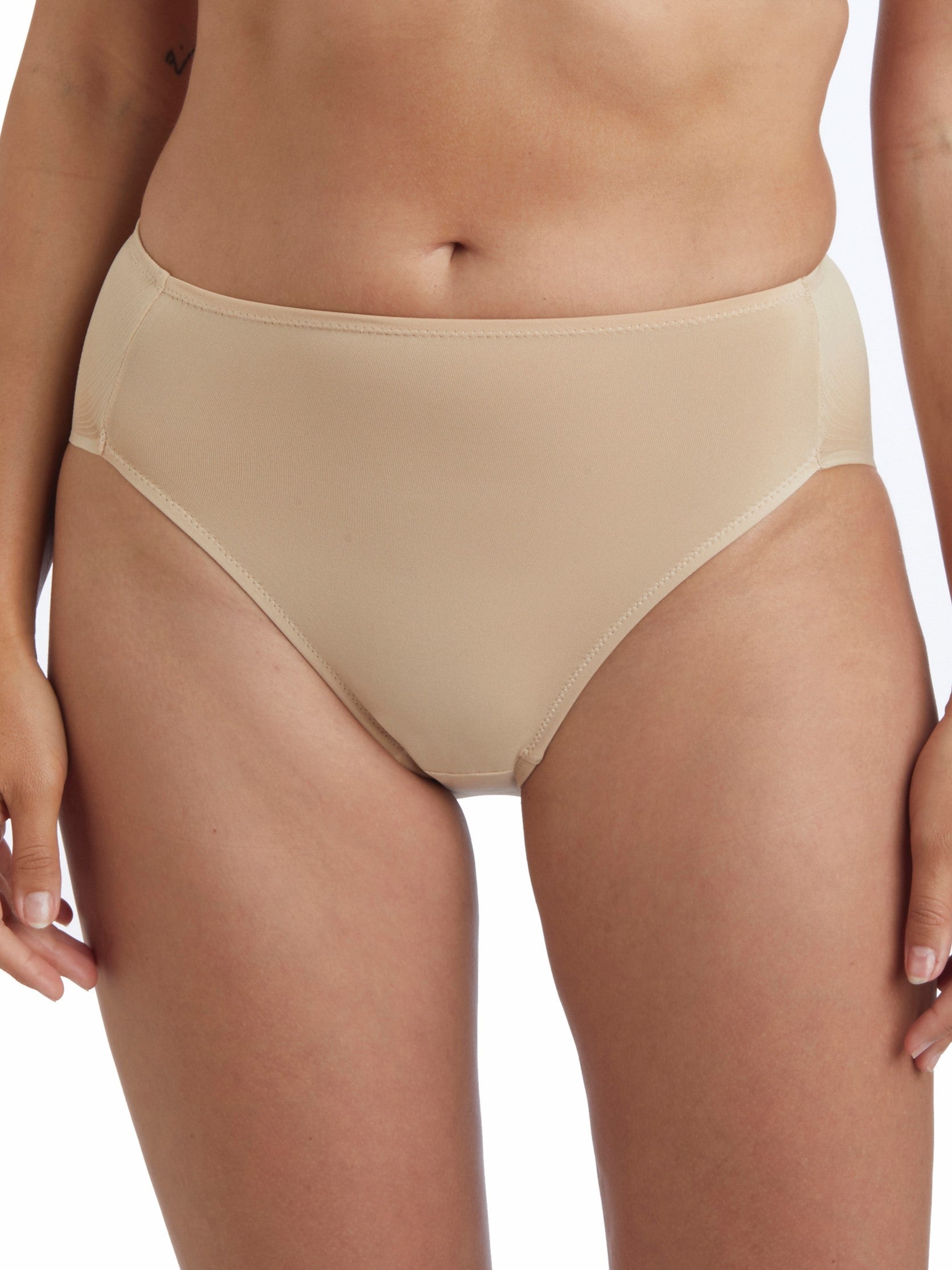 a woman wearing a nude high cut brief panty