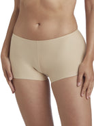 a woman wearing a nude boyshort panty