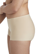 a woman wearing a beige boyshort panty