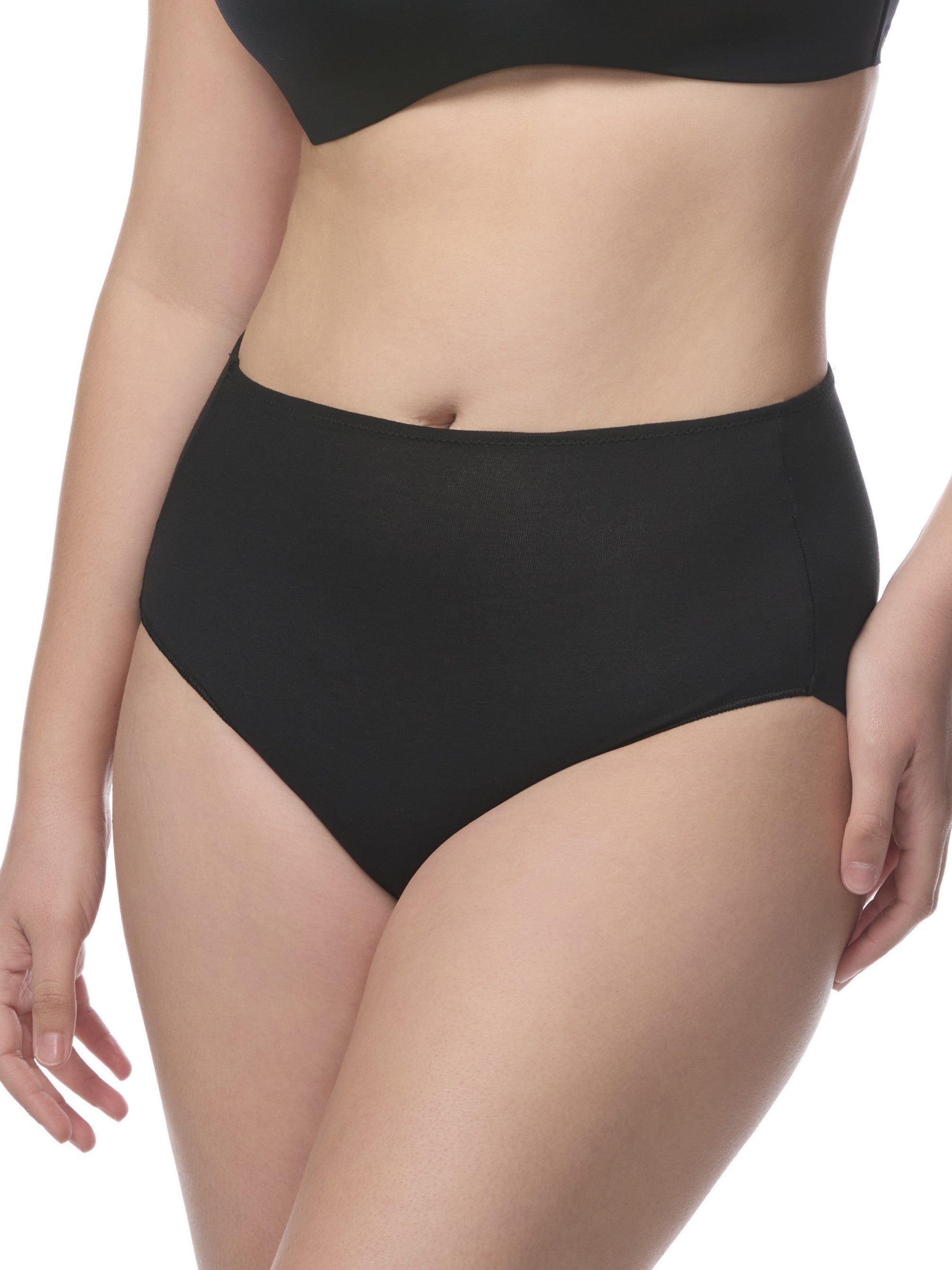 Black underwear being worn by a person on a white background