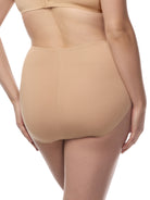 a woman wearing tan cotton blend women's brief panty