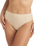 a woman wearing a beige high-cut brief panty