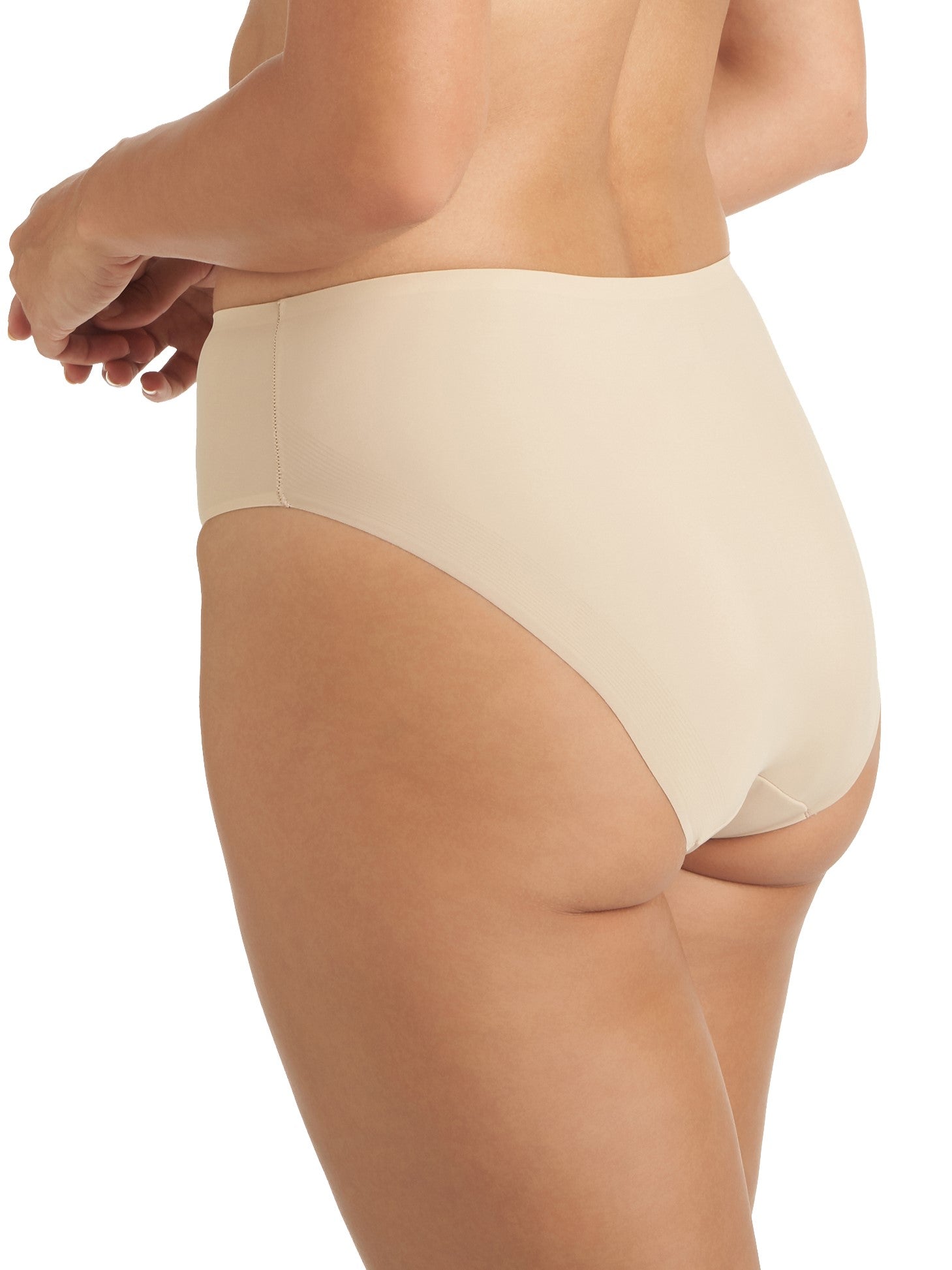 a woman wearing a beige high-cut brief panty