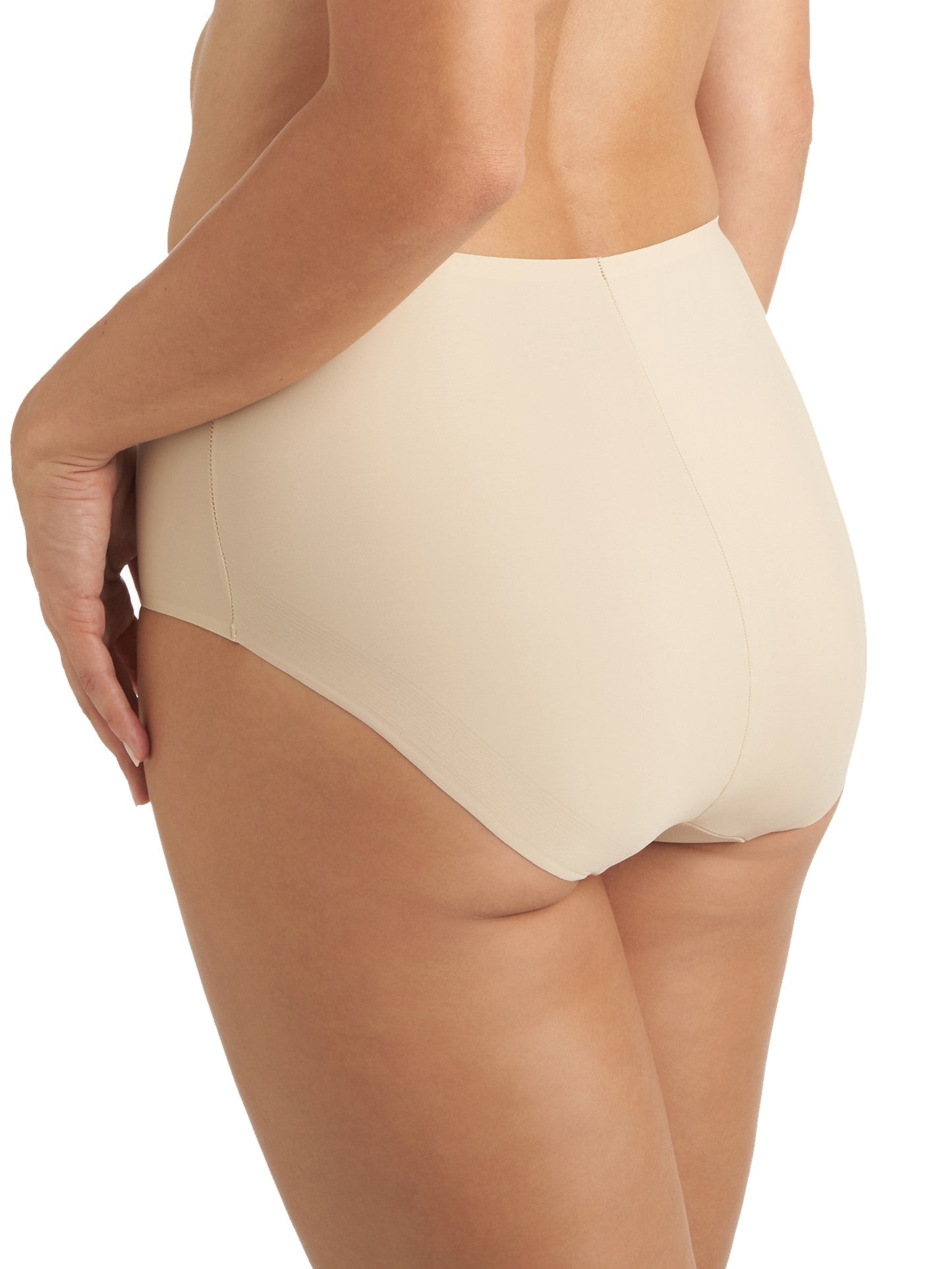 a woman wearing a beige brief panty