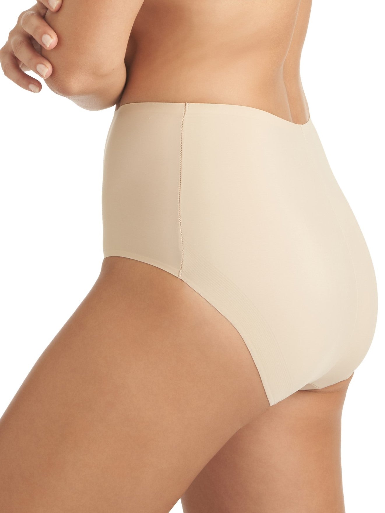 a woman wearing a beige brief panty