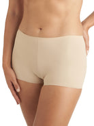 a woman wearing a nude boyshort panty