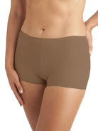 a woman wearing a brown boyshort panty