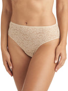 a woman wearing a nude lace high cut brief panty