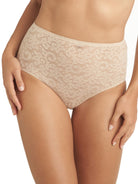 a woman wearing a nude lace brief panty