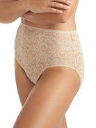 a woman wearing a nude lace brief panty