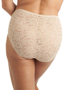 a woman wearing a beige brief panty