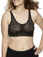 a woman wearing a black lace bralette