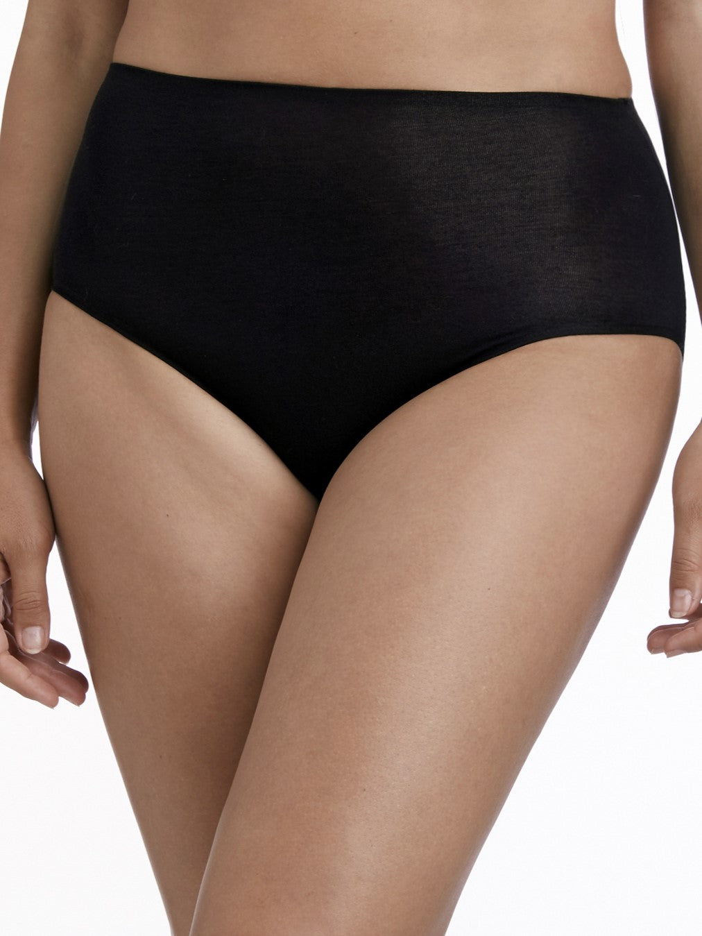 a woman wearing a black brief panty