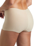 a woman wearing a nude boyshort panty