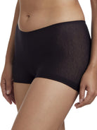 a woman wearing a black boyshort panty