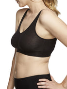 a woman wearing a black bralette