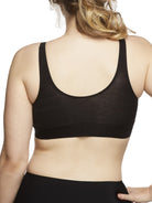 a woman wearing a black bralette