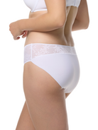 a woman wearing a white lace hipster panty